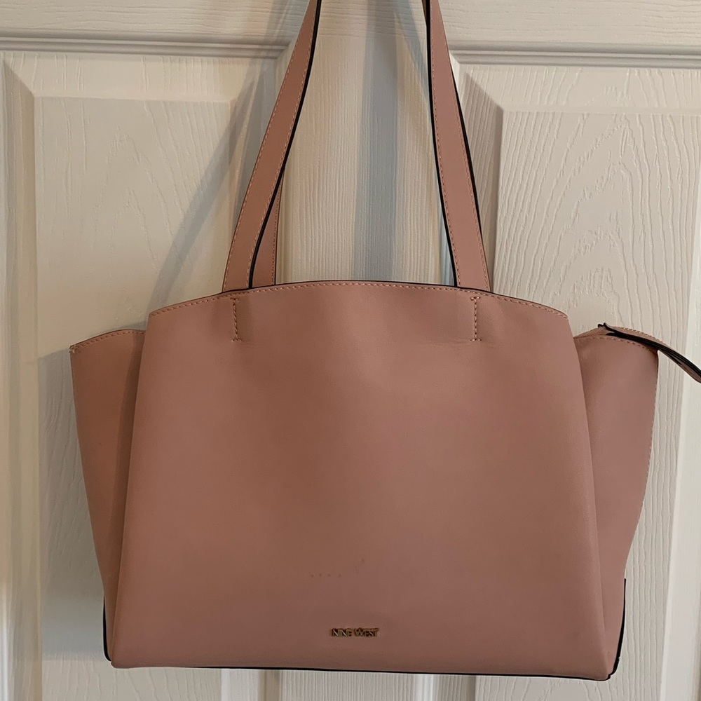 Gently used Rose Pink Nine West with gold lining
